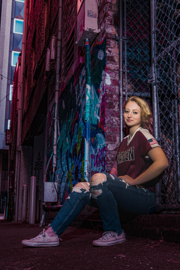 This high school senior poses in an artistic alley in downtown Knoxville near market Square