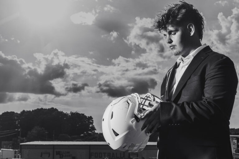Knoxville High School Senior Football Player Poses for an Epic Portriat