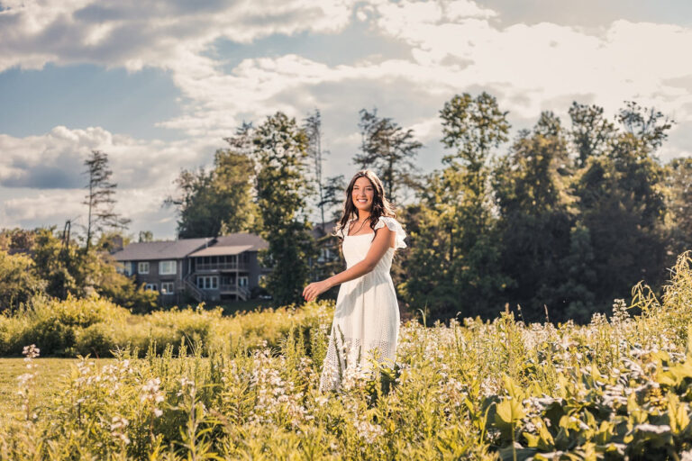 A knoxville senior portrait in a beautiful field near oak ridge